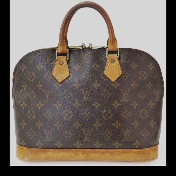 LOUIS VUITTON Alma Monogram Canvas and Leather - Picture 1 of 9